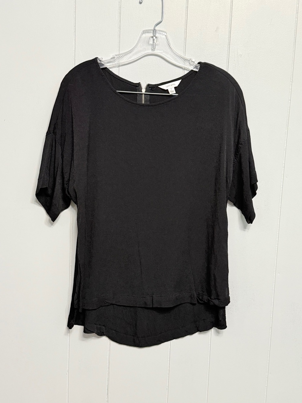 #7)  Lost April Black short sleeve top With back zipper closure